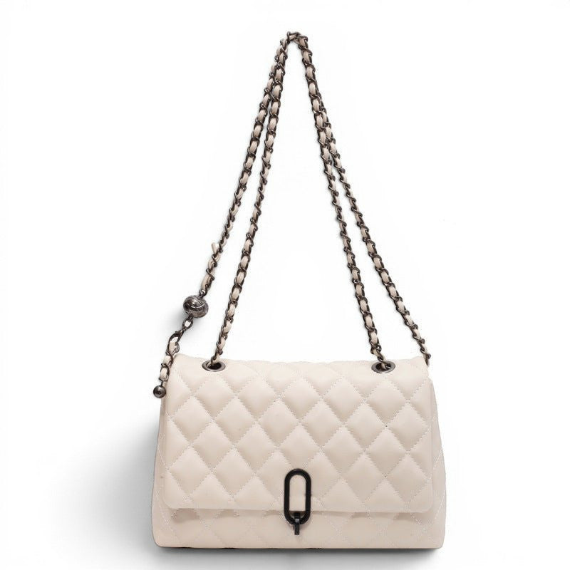 ZOFIA ATELIER off-white PU quilted horizontal rectangle shoulder bag with chain strap and metal clasp.