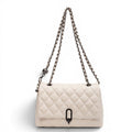 ZOFIA ATELIER off-white PU quilted horizontal rectangle shoulder bag with chain strap and metal clasp.