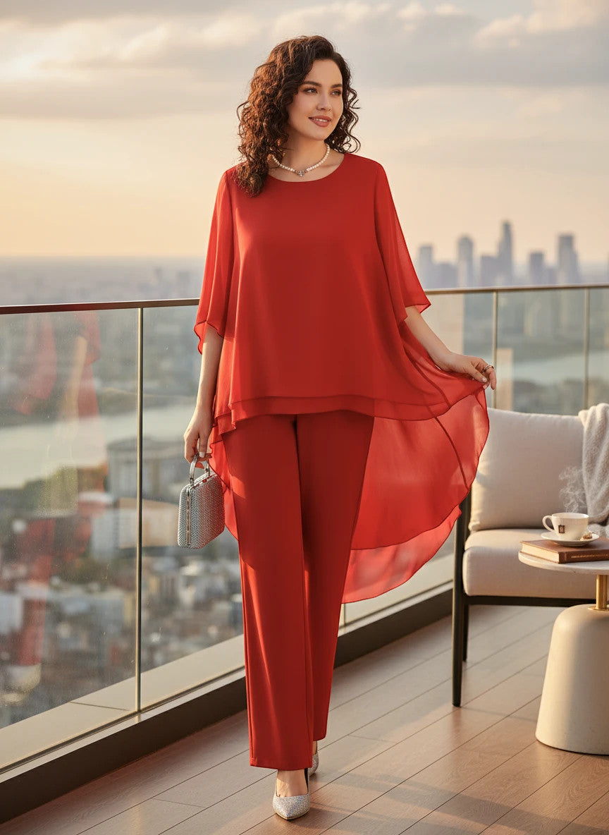 ZOFIA ATELIER red flowy chiffon ensemble with wide-leg pants and a layered, asymmetrical top.
