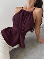 ZOFIA ATELIER deep red halter neck sleeveless polyester blouse with waist-cinching detail and open back.
