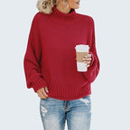 ZOFIA ATELIER Anna red chunky knit turtleneck sweater with relaxed fit and long sleeves.