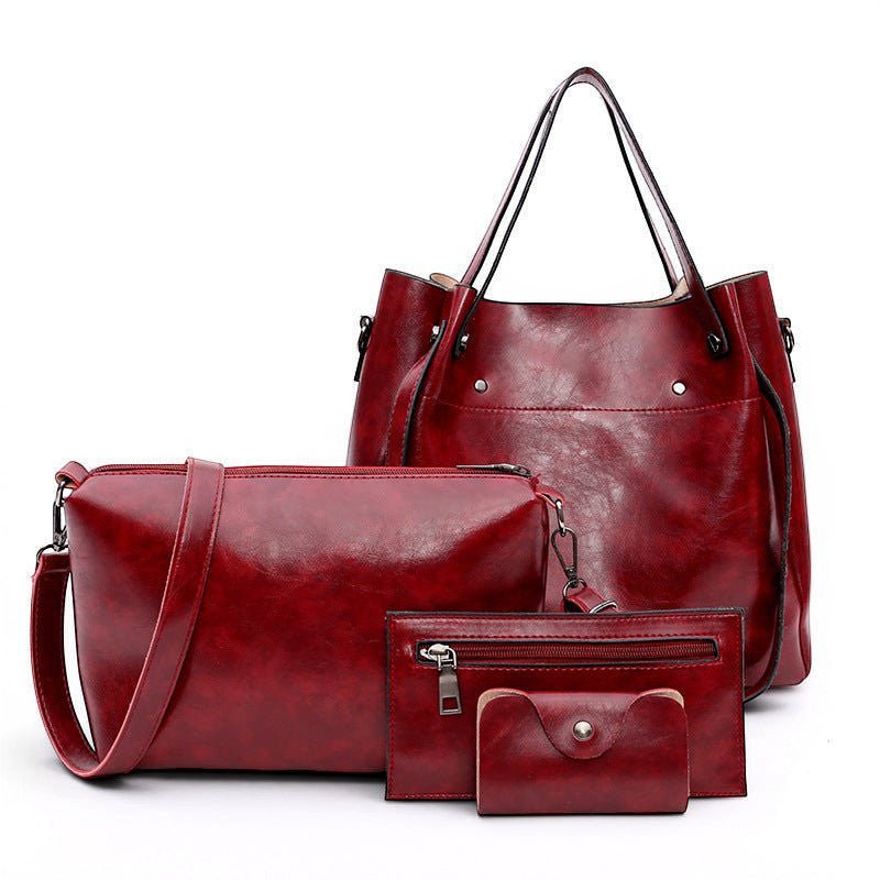 ZOFIA ATELIER red PU leather 4-piece handbag set with medium bucket bag, crossbody, zipper pouch, and cardholder.