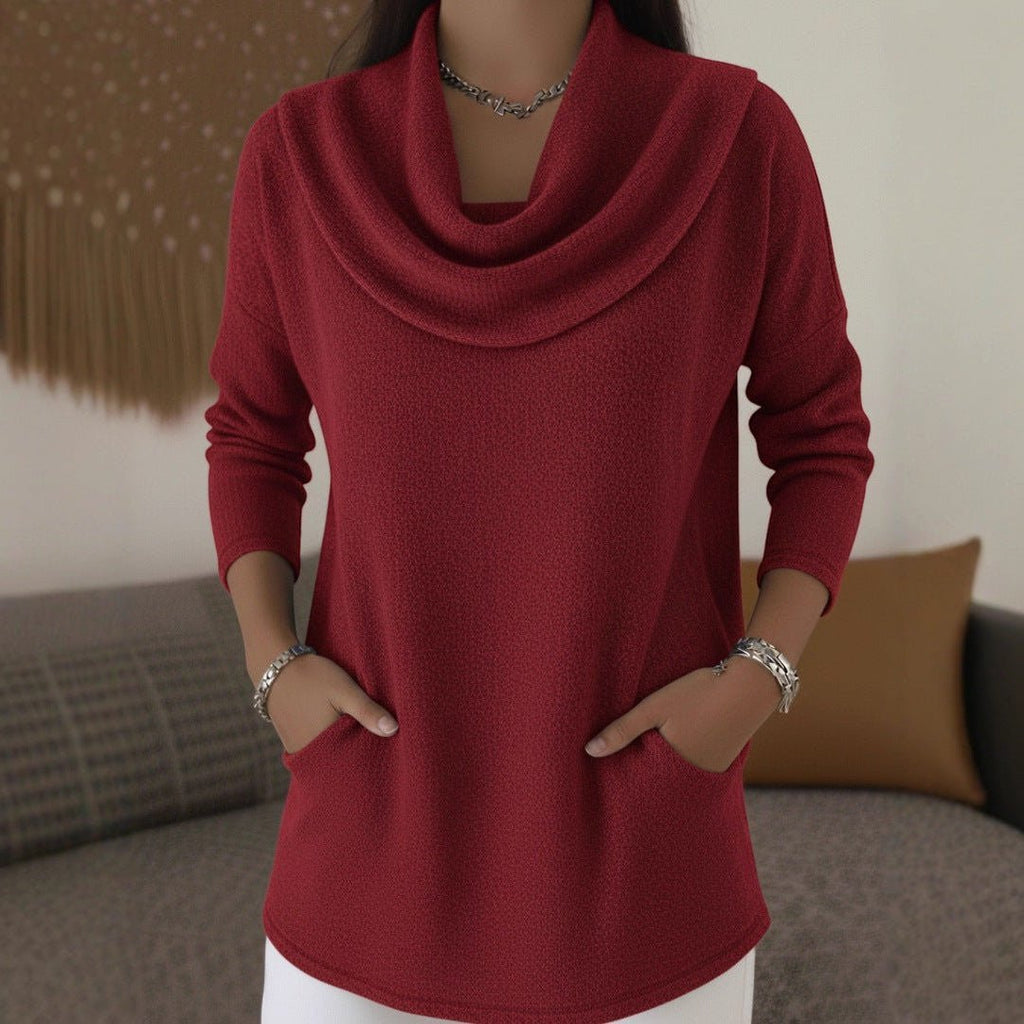 ZOFIA ATELIER red long sleeve polyester pullover with cowl neck and front pockets.