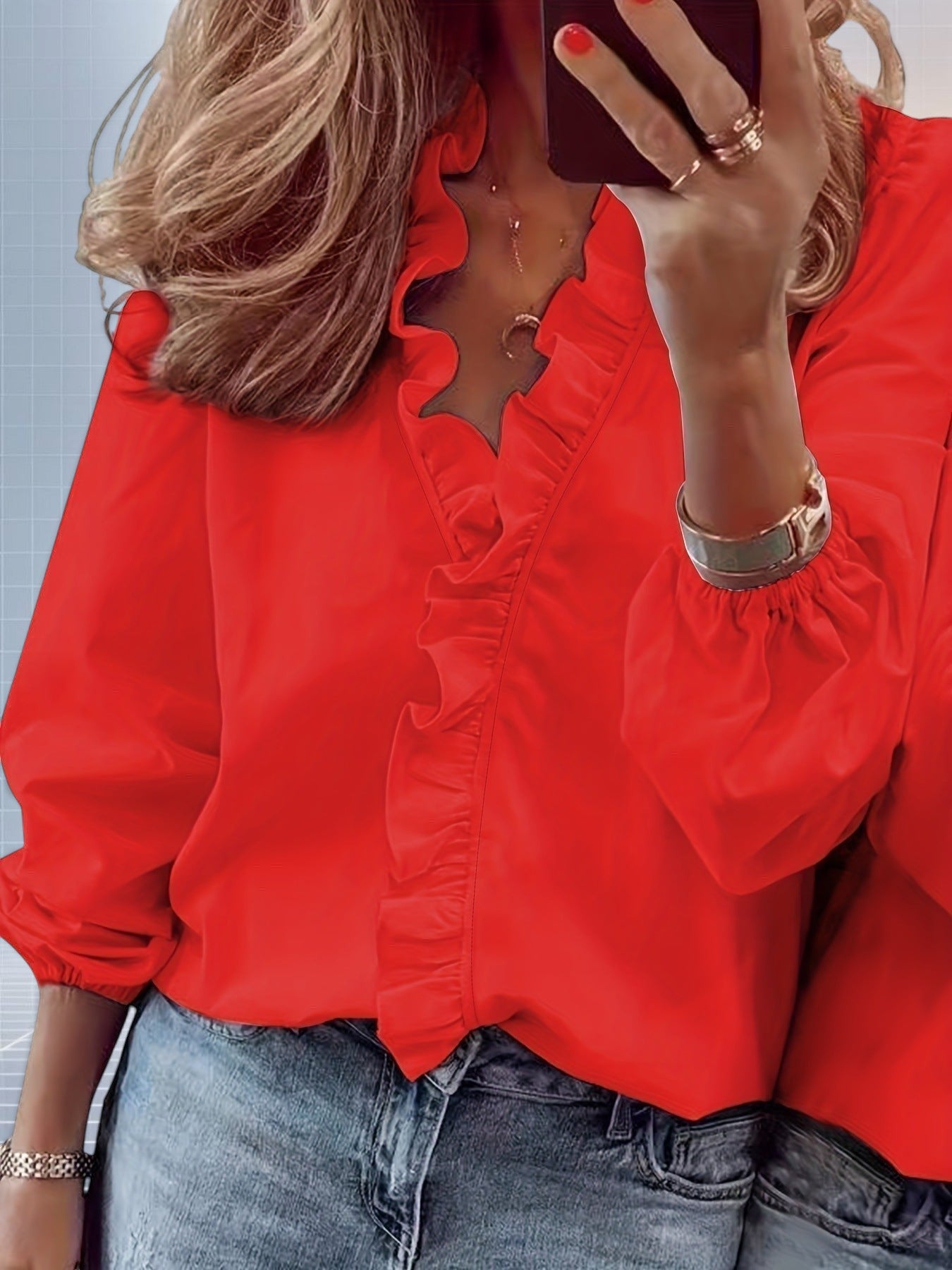 ZOFIA ATELIER red long sleeve ruffle blouse with split collar and elastic cuffs. Casual yet elegant.