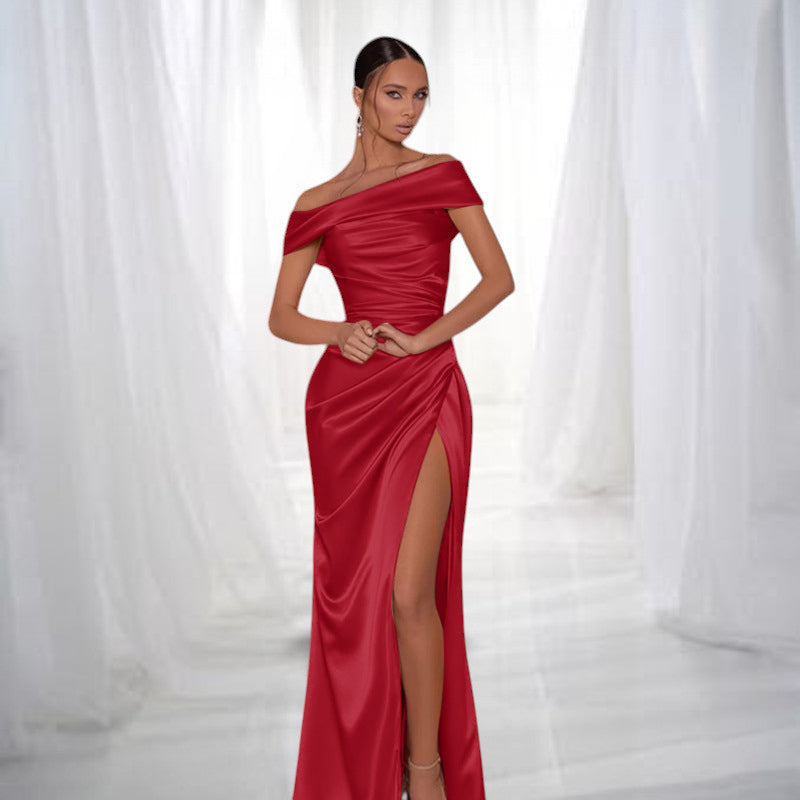 ZOFIA ATELIER red satin off-the-shoulder maxi dress with a high slit and draped detailing.
