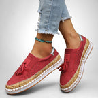 ZOFIA ATELIER red artificial PU tassel round toe flats with perforated detail and cork-effect sole.