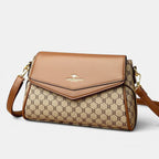 ZOFIA ATELIER Renata crossbody bag in brown PU with patchwork stitching and horizontal rectangular shape.