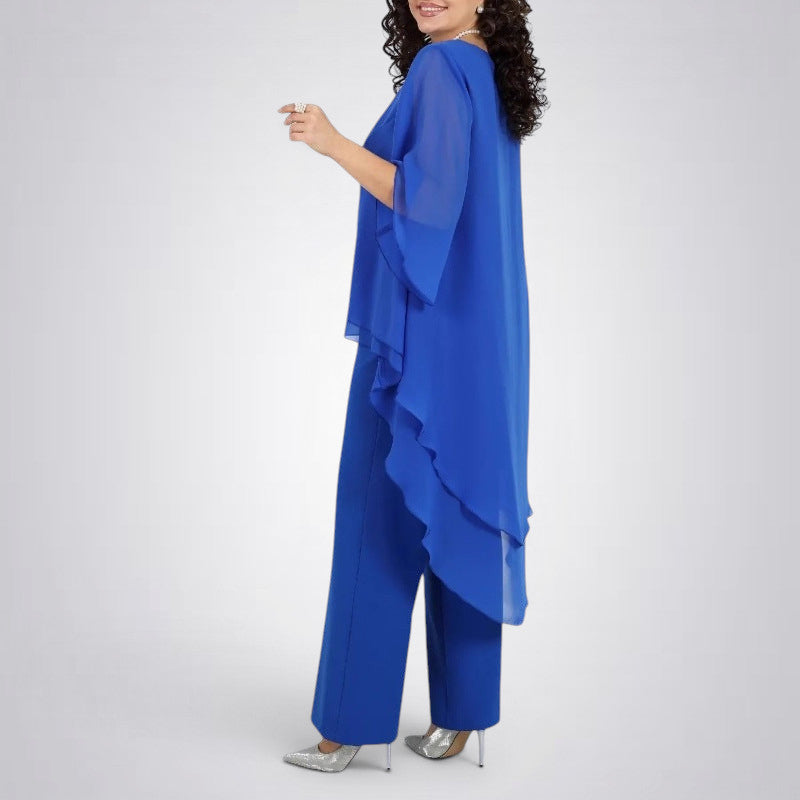 ZOFIA ATELIER royal blue flowy chiffon ensemble with wide-leg pants and layered asymmetrical hem top.