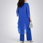 ZOFIA ATELIER royal blue flowy chiffon ensemble with wide-leg pants and a layered tunic top.
