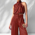 ZOFIA ATELIER rust-colored sleeveless halter neck crop top with wide-leg trousers set made of regenerated cellulose fiber.