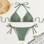 ZOFIA ATELIER sage green halter bikini with tie-side bottoms, made of polyester and nylon. Perfect for swimming.