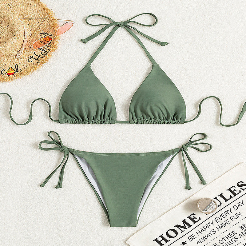 ZOFIA ATELIER sage green halter bikini with tie-side bottoms, made of polyester and nylon. Perfect for swimming.