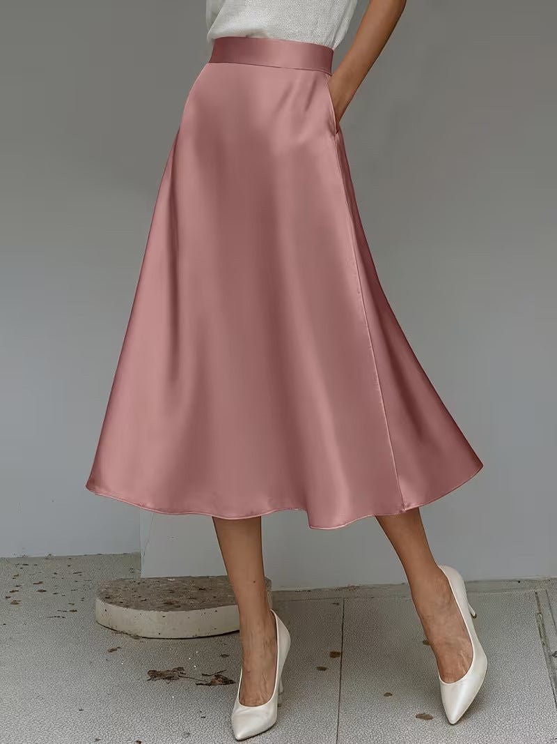 ZOFIA ATELIER dusty rose satin mid-length A-line skirt with pockets and slight stretch.