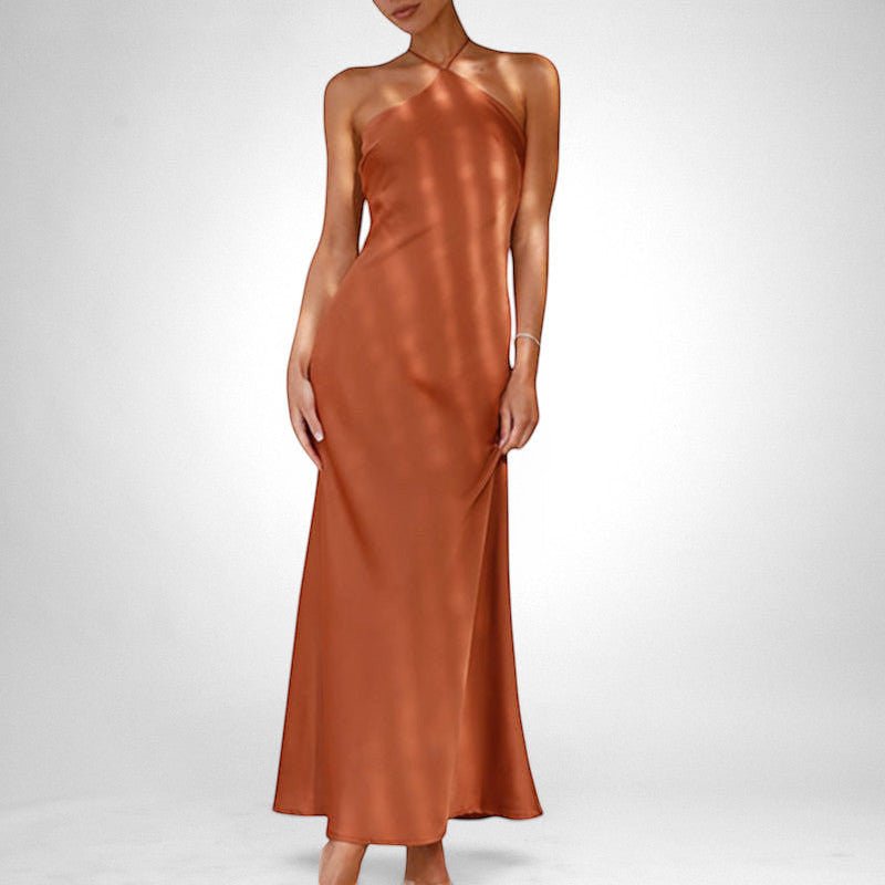 ZOFIA ATELIER ANIA sleeveless backless maxi dress in rust polyester with halter neck. Slim fit.