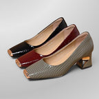 ZOFIA ATELIER snake pattern chunky heel shoes in black, red, and gray with square toes and metallic accents.