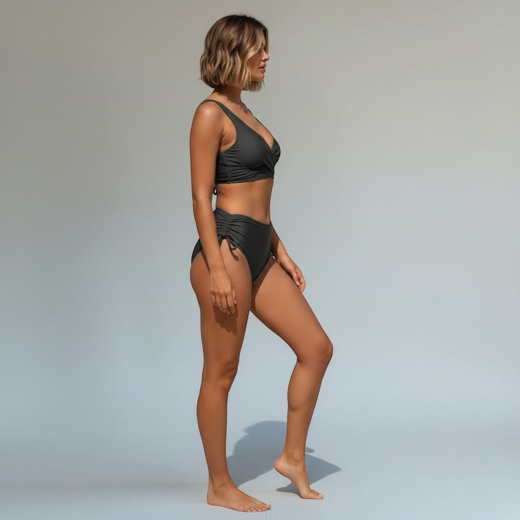 ZOFIA ATELIER Sylwia strappy dark grey bikini set with ruched high-waisted bottoms and a wrap-style top.