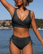 ZOFIA ATELIER Sylwia strappy dark grey bikini with ruched high-waisted bottoms and tie details.
