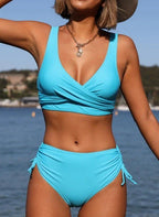 ZOFIA ATELIER Sylwia strappy turquoise bikini with ruched high-waisted bottoms and side ties.