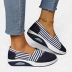 ZOFIA ATELIER navy and white striped canvas slip-on shoes with a shallow mouth and platform sole.
