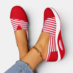 ZOFIA ATELIER red and white striped canvas slip-on shoes with a shallow mouth and cloth lining.