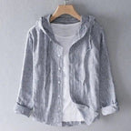ZOFIA ATELIER grey and white striped linen blend hooded blouse with white t-shirt underneath.