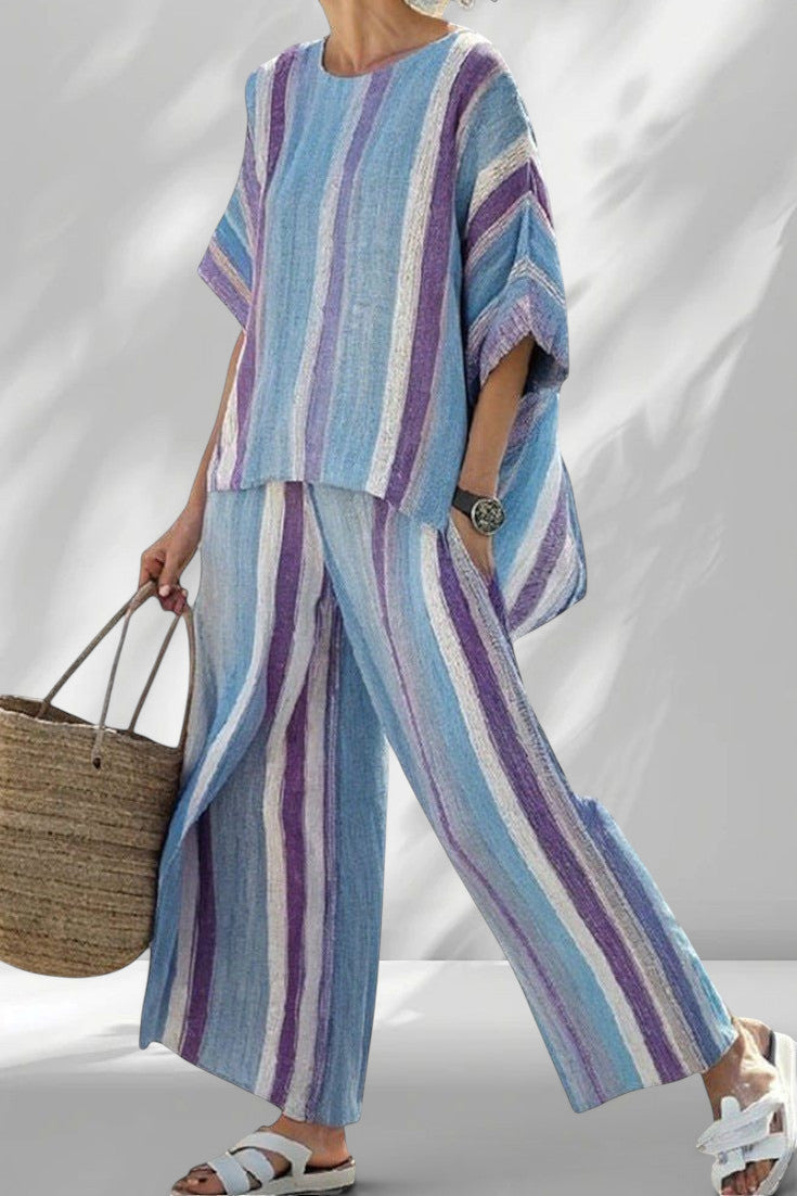 ZOFIA ATELIER BARBARA striped lounge set with wide-leg pants and relaxed-fit top in blue, purple, and white.