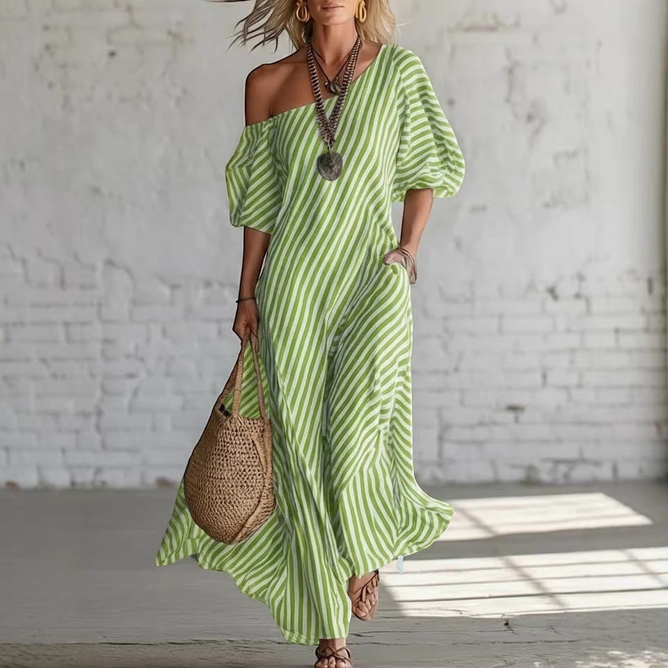 ZOFIA ATELIER green and white striped off-shoulder maxi dress made of polyester with short sleeves and pockets.