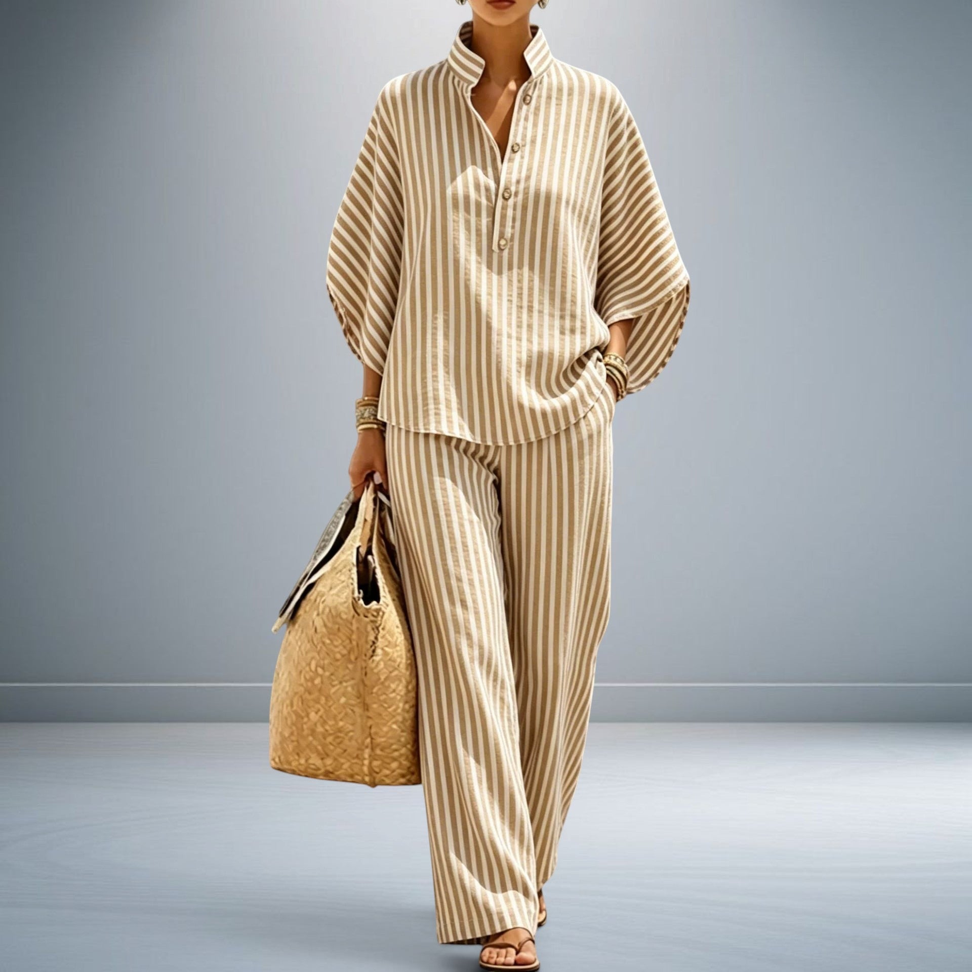 ZOFIA ATELIER women's beige and white striped polyester shirt and pants set with three-quarter sleeves.