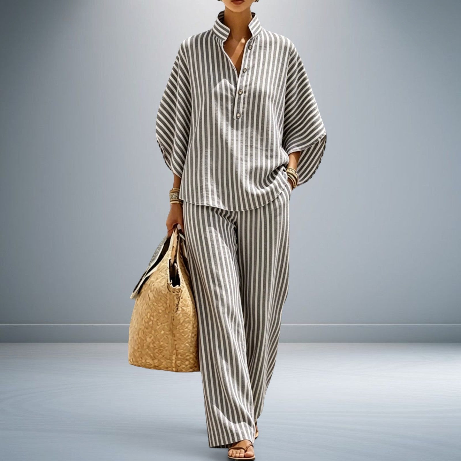 ZOFIA ATELIER MIROSŁAWA striped polyester shirt set with three-quarter sleeves and full-length pants.