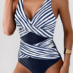 ZOFIA ATELIER Magdalena navy and white striped sleeveless one-piece swimsuit with a flattering wrap design.