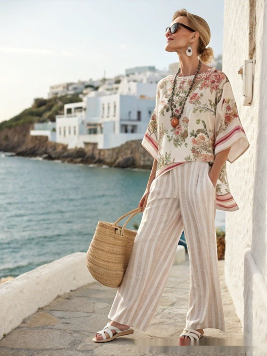ZOFIA ATELIER KORNELIA striped wide-leg set with floral print top and beige striped pants.