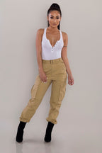 ZOFIA ATELIER tan cotton blend slim-fit cargo overalls with high waist and zipper detail