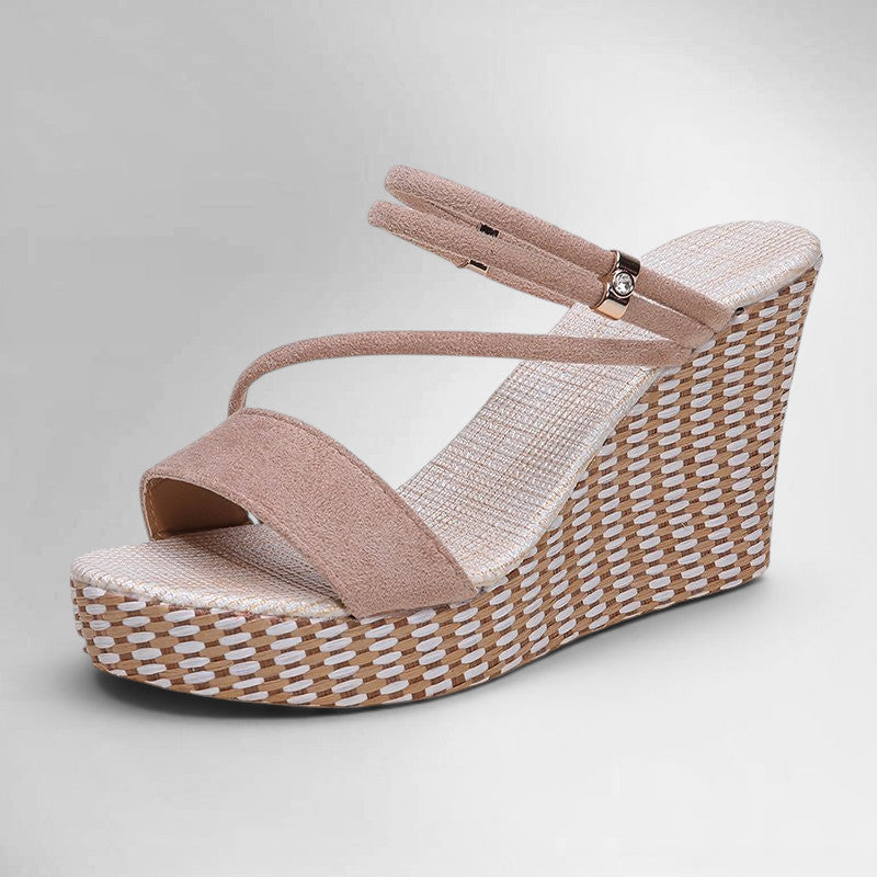 ZOFIA ATELIER tan suede platform wedge sandals with criss-cross straps and woven espadrille detail.