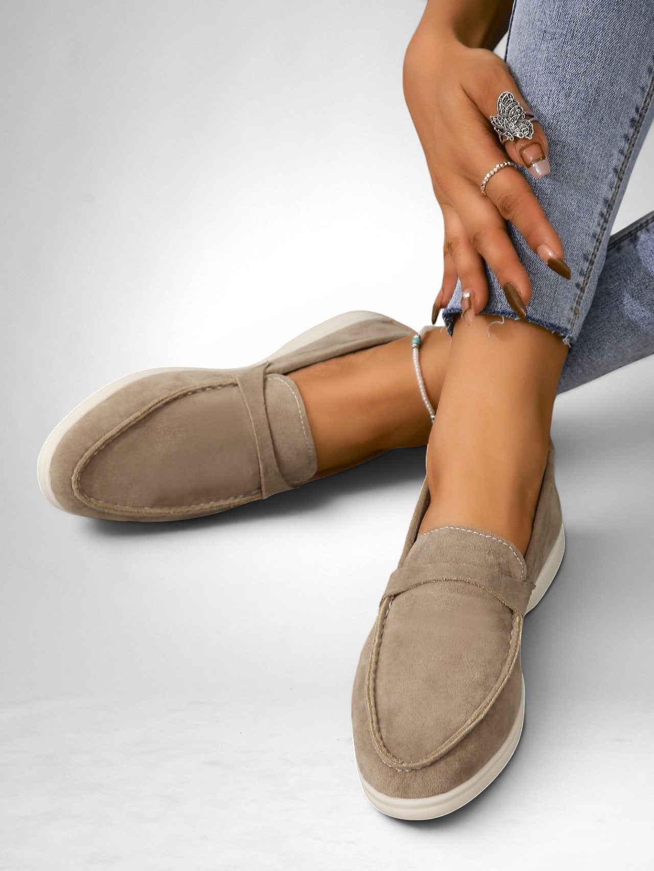 ZOFIA ATELIER taupe suede-style slip-on flats with a retro minimalist design and comfortable flat sole.