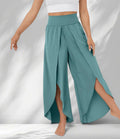ZOFIA ATELIER teal polyester fiber high waist cropped trousers with tulip hem and side slits. Includes inset pocket.