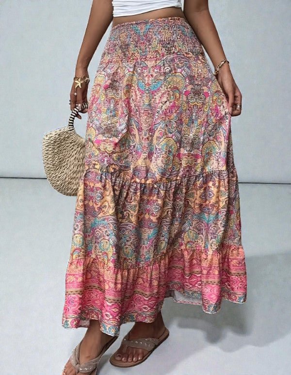 ZOFIA ATELIER artistic vintage maxi skirt with a colorful paisley print, elastic waistband, and tiered ruffles. Flowy bohemian style.
