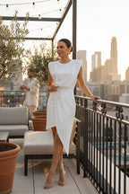 ZOFIA ATELIER white sleeveless asymmetric dress with padded shoulders and a draped skirt, perfect for business or cocktail events.