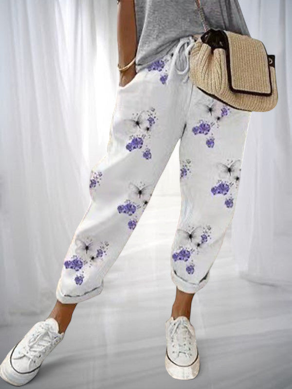 ZOFIA ATELIER white cotton linen pants with purple butterfly and floral print, loose fit, drawstring waist.