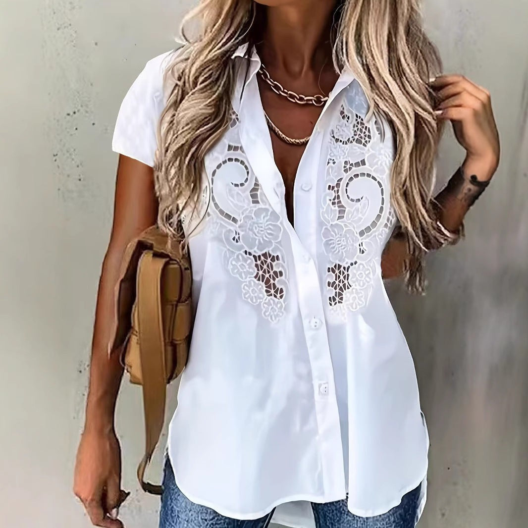 ZOFIA ATELIER white short-sleeved rayon and polyester blouse with embroidered lace detail.