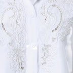 ZOFIA ATELIER white embroidered lace blouse with short sleeves and hollow-out design. Made of polyester and rayon.