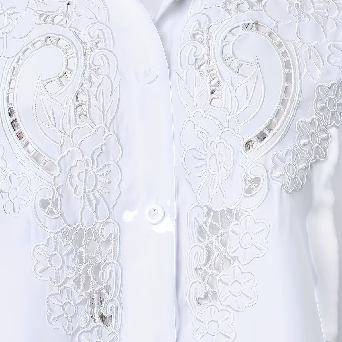 ZOFIA ATELIER white embroidered lace blouse with short sleeves and hollow-out design. Made of polyester and rayon.