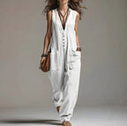 ZOFIA ATELIER white sleeveless polyester jumpsuit with lace trim and pockets. Straight fit, mid-rise waist.