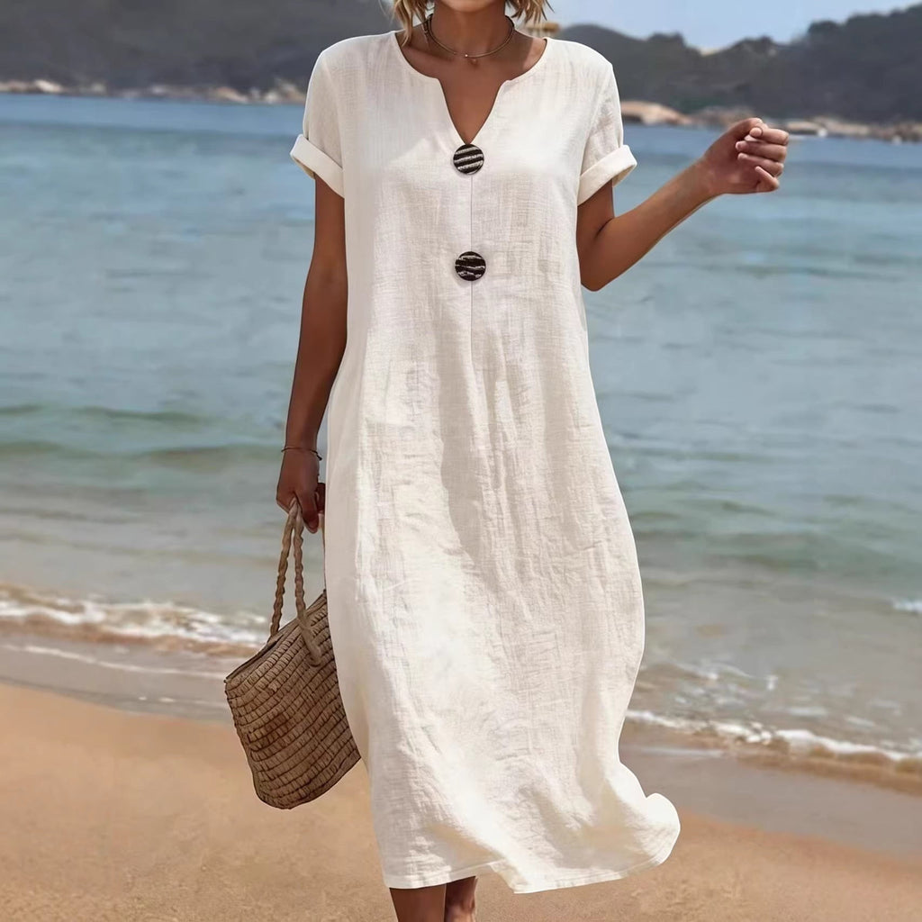 ZOFIA ATELIER white linen-blend short sleeve midi dress with decorative buttons, v-neck, and loose fit.