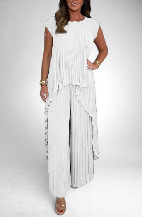 ZOFIA ATELIER white pleated short sleeve suit with wide leg pants. Polyester fabric.