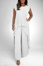 ZOFIA ATELIER white pleated short sleeve suit with wide leg pants. Polyester fabric.