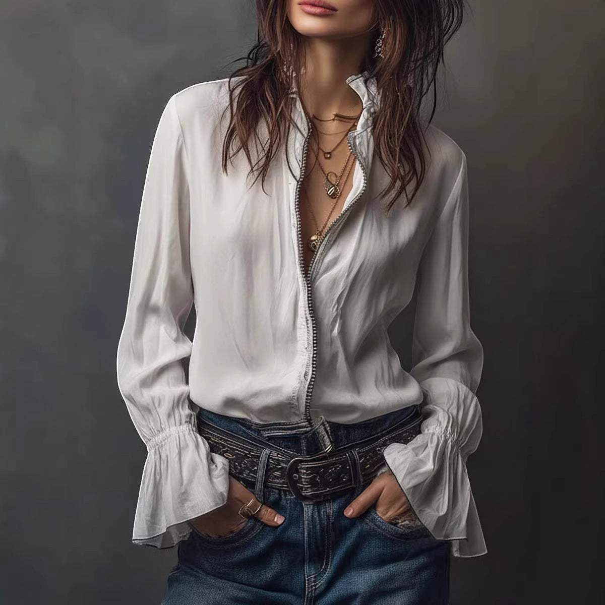 ZOFIA ATELIER white polyester long sleeve ruffled shirt with zip front and layered necklaces.