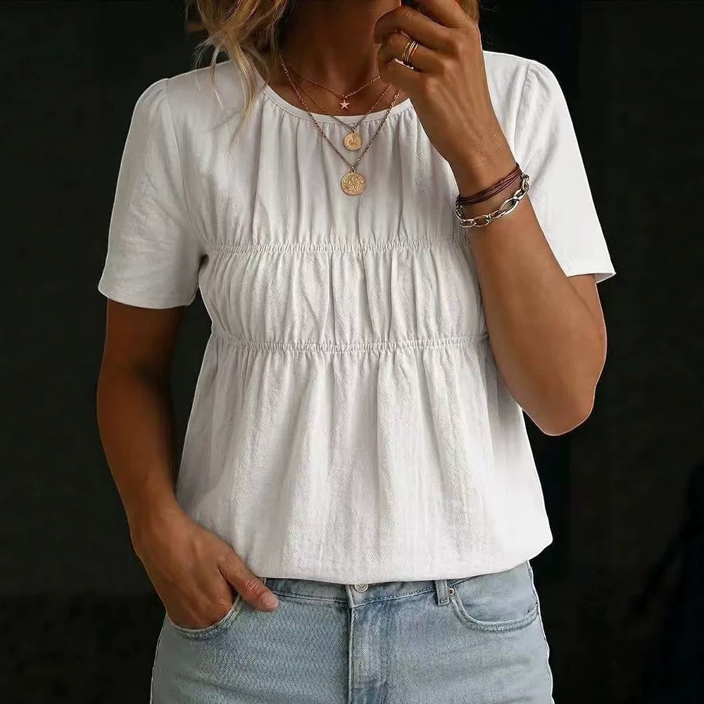 ZOFIA ATELIER white cotton-linen blend short-sleeve top with crew neck and smocked bodice detail.
