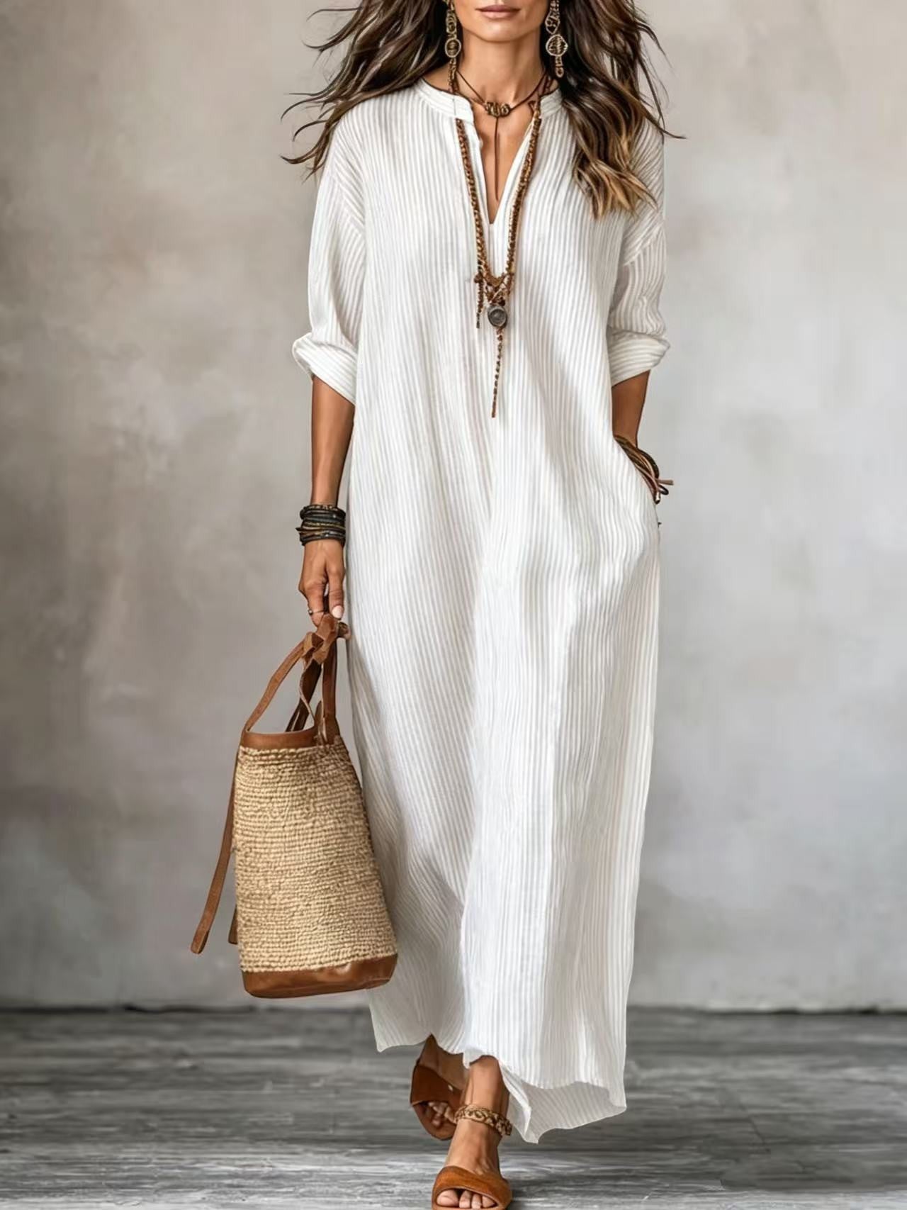 ZOFIA ATELIER white striped V-neck polyester loose fit long dress with three-quarter sleeves.