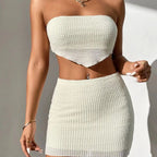 ZOFIA ATELIER white waffle knit bandeau top and mini skirt set with pineapple plaid weave.