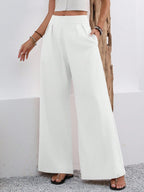 ZOFIA ATELIER white polyester wide-leg trousers with high waist and pockets, full length.